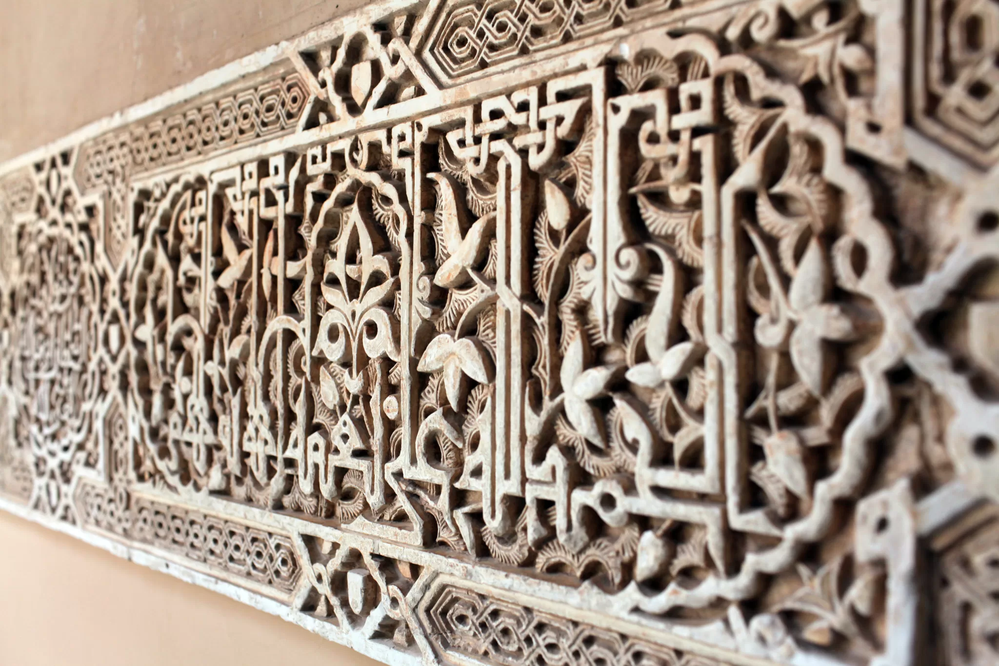 A selective focus shot of a carving of Real Alcazar, Spain